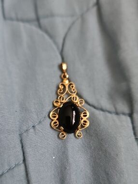Gold Filigree Pendant Necklace with Black Cabochon